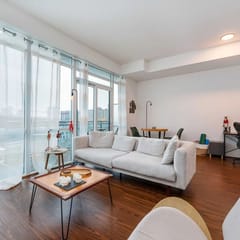 Modern 1BR + Den Condo with Sauna Access