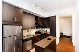 Modern 1BR + Den Condo with Sauna Access - Image 2