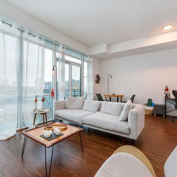 Modern 1BR + Den Condo with Sauna Access - Image 1