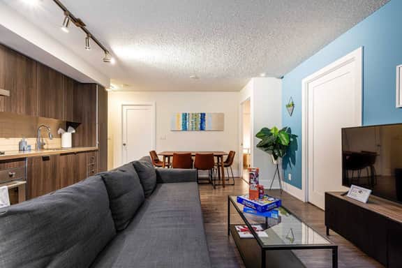 Sleek 3BR Retreat with Skyline Views - Image 2