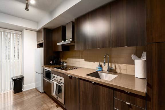 Sleek 3BR Retreat with Skyline Views - Image 4